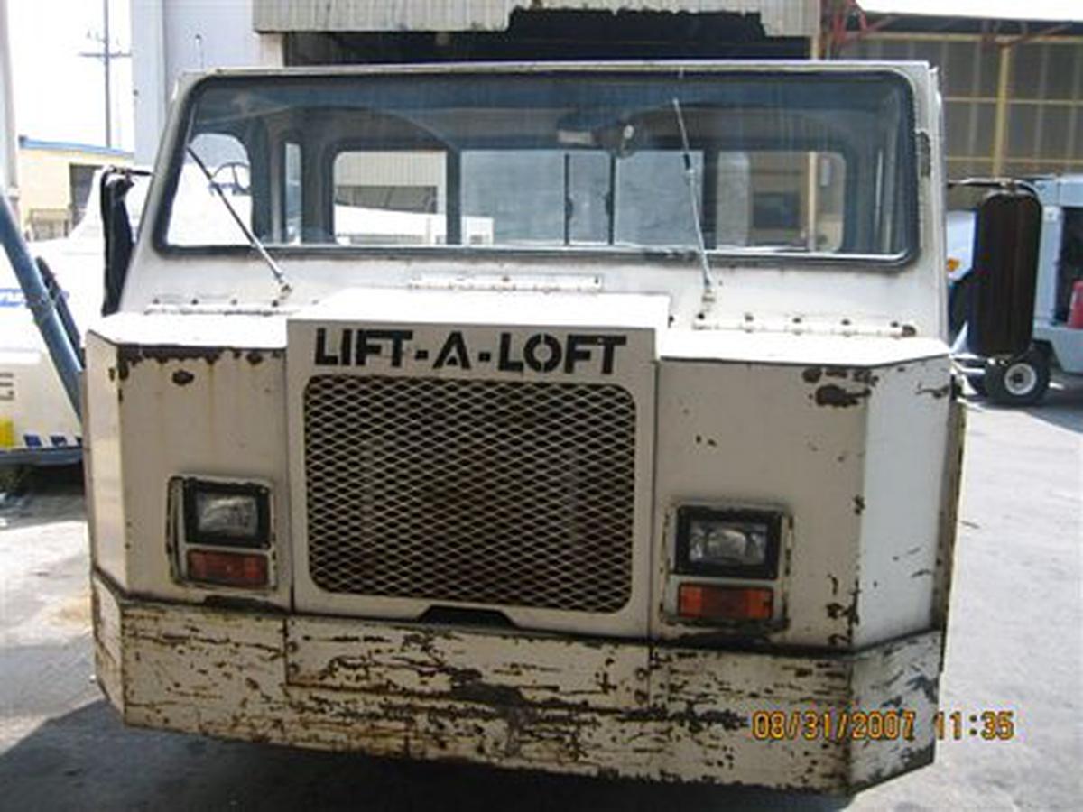 2000 Lift-A-Loft APV Flat Bed